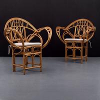 Pair of McGuire Rattan Arm Chairs, Paige Rense Noland Estate - Sold for $2,125 on 05-15-2021 (Lot 7).jpg